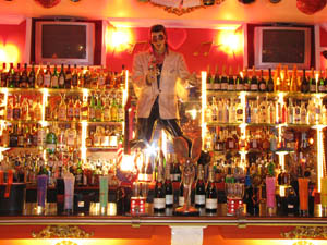 Millionayr Casino, Ayr. Elvis behind the bar. - click to enlarge